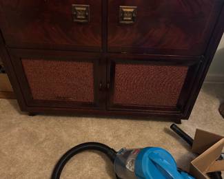 This is a two for one you get a vacuum cleaner and the music cabinet, vintage, mid-century, record player and radio