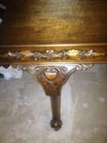 Kranich & Back baby grand piano's cabriolet leg with carving detail