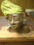 "Charles" a rendition of an African on a slab of oak