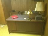 Executive desk with chair and filing cabinet