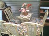 Occasional bamboo style glass top table and 6 chairs
