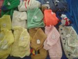 Baby sweaters and caps.