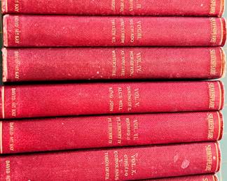 displays a set of volumes containing the complete works of William Shakespeare