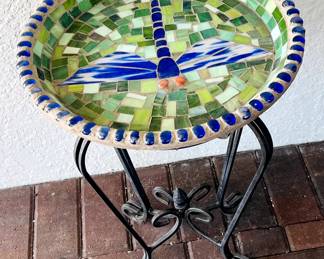 mosaic glass bird bath with a metal stand