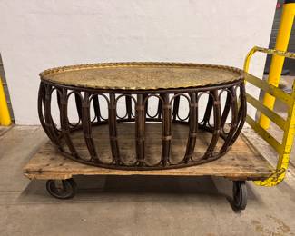Extremely LARGE and REGAL brass & rattan coffee table. Measuring at 54”L 33”D 20.5”Tall