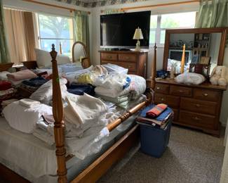 King size bed with two twin mattresses, large mirror, high dresser, wide dresser with mirror, linens, etc.
