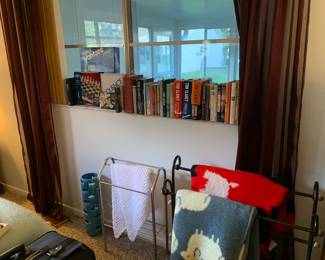 Books, games, towel, rack, blanket, rack, and more