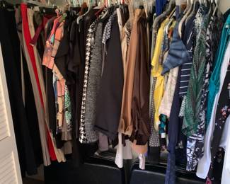 Beautiful clothing (mostly women’s around size xl but it ranges, lots of high quality items including worthington), two suitcases and foot bath