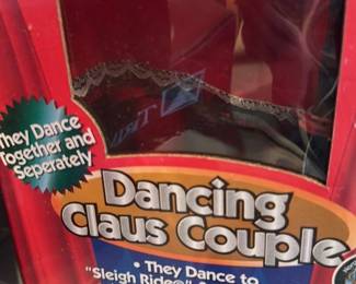 Dancing Santa and Mrs. Claus Couple