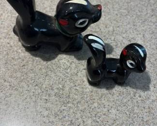 Ceramic Skunk Figurines