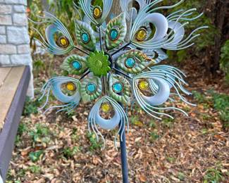 Peacock feather stake, $12