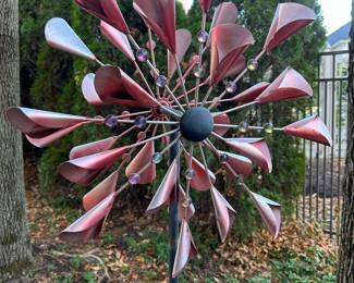 Large red metal wind spinner for garden, $20