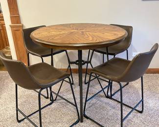 High top table + 4 chairs, 40"D x 36"H,  $295
