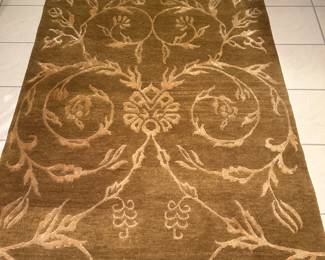 Dark Gold wool rug, 5'6" x 8',  $125