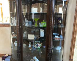 Curved glass lighted Curio cabinet, 56”W x 72”H x 12”D,  $575