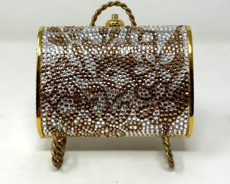 Judith Lieber gold handbag, $395