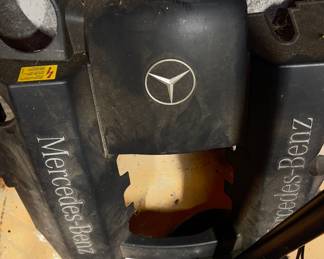 Mercedes-Benz engine cover.
The cover is a plastic component designed to fit over a Mercedes-Benz engine.