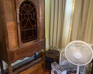 Fans, antique cupboard