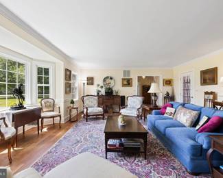 Room furniture and rugs. *artwork shown is not available.