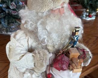 Vintage Santa Claus Figurine with Toy Assortment