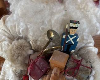 Vintage Santa Claus Figurine with Toy Assortment