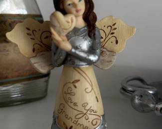 Angel Figurine Holding Baby