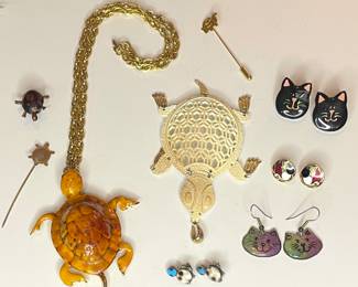 Jewelry featuring turtles & cats 