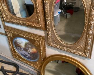 Gold frame mirrors and art