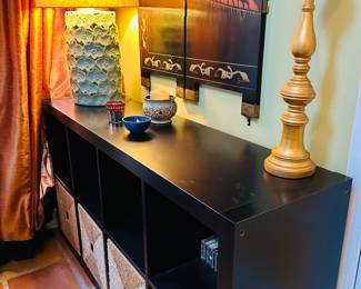 Storage units with baskets (2 avail).  Lamps.  Asian wall hanging is not for sale. 