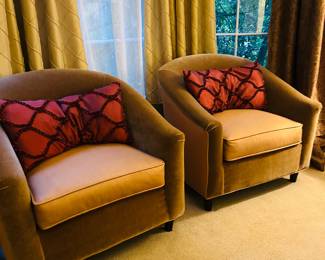 Pair of tub accent chairs.  Red decorative pillows 