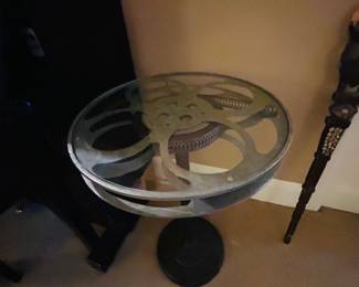 Glass top “film reel” side table 