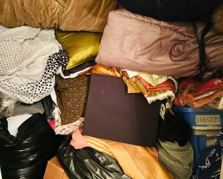 Closet full of crate and barrel material samples 