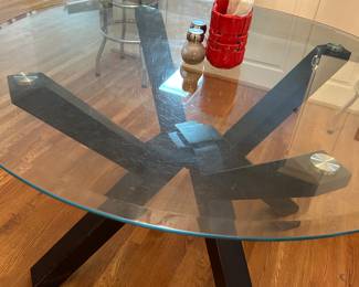 Round glass kitchen table- seats four chairs.   
