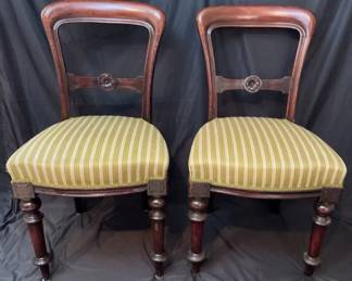 Twin Green Cushioned Chairs