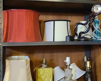 Glass, metal, and ceramic base lamps many with matching shades. Board games of all varieties. 