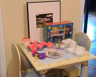 Play table, "Fiestaware" style play tea set, Raggedy Ann plate. Very old printed picture. Landscape picture. 