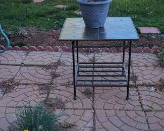 Heavy metal and tile table. 