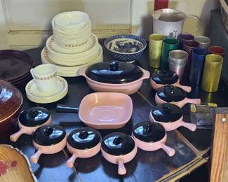 Corelle butterfly flower set. Black and pink set. Metal pitcher and cups. Black oval table with leaves. 