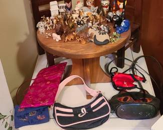 Mini play table and chairs, glass and porcelain animals, children's purses.  