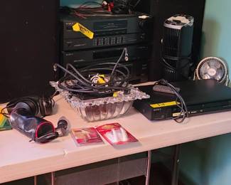 Sound system and various electronics. Cords. Rolling cart. 