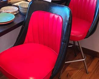 Retro leather diner chairs. Metal trays. Large bowls. 