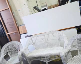 	White Wicker Loveseat and Two Chairs