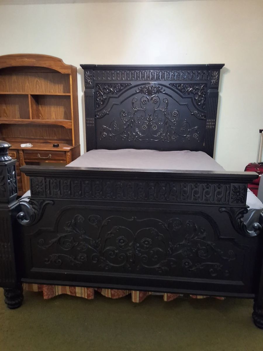 Queen bed. Ornate black wood. Like new mattress and box spring also available. 