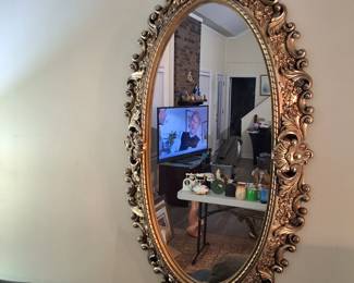 Vintage rare glass top gilt and faux marble coffee and end tables, and large oval wall mirror. Coffee and end tables sold as set. Mirror can be purchased separately.