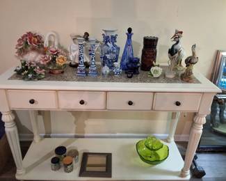 White wood bar cart with fold-down leaf, and stone in-set top.