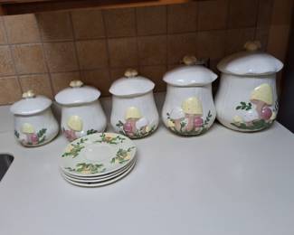 Set of ceramic mushroom kitchen canisters with matching plates