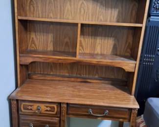 Wood desk with removable shelving unit.