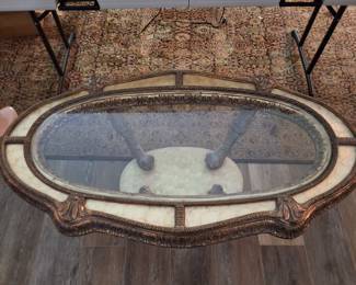 Vintage rare glass top gilt and faux marble coffee table, end tables (2), and large oval wall mirror. Coffee and end tables sold as set. Mirror can be purchased separately.
