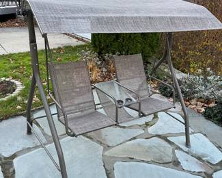 Two-person canopy swing with adjustable canopy and tray/cupholders.