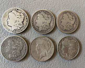 Antique silver dollars.